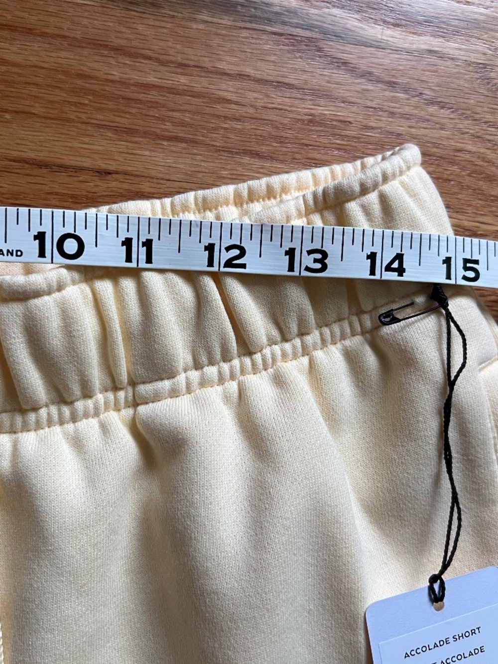 ALO Yoga Candlelight Yellow High-Rise Athletic Shorts with Drawstring - Picture 7 of 15